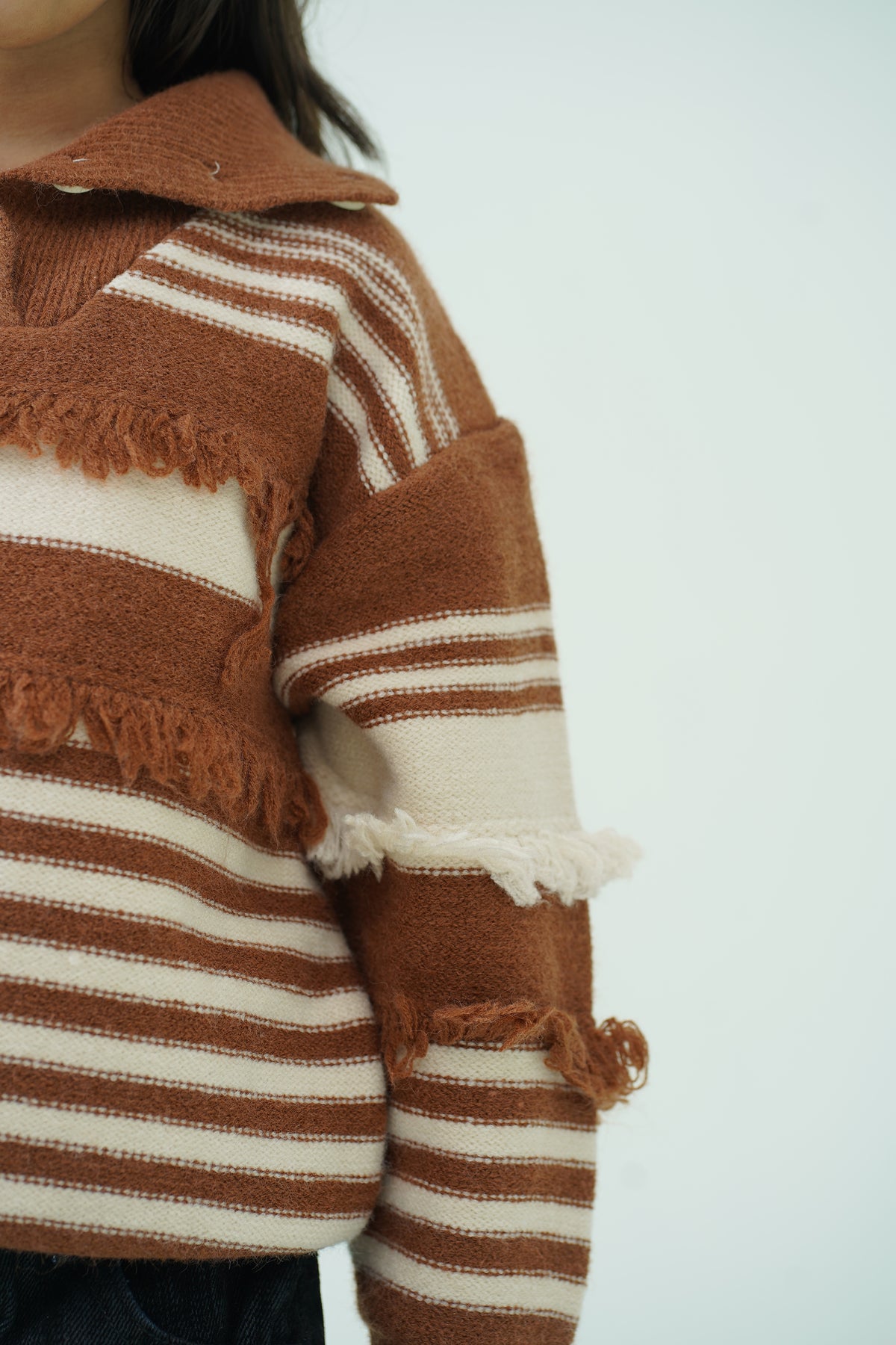 BROWN SWEATER Reality