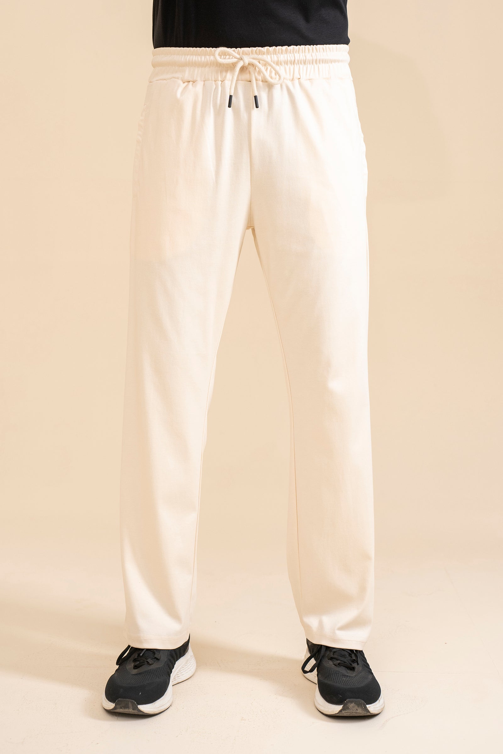 CREAM INTERLOCK KNITTED TROUSER Reality